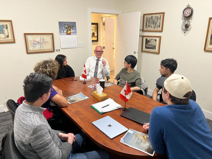 Ernie meeting with constituents around a table